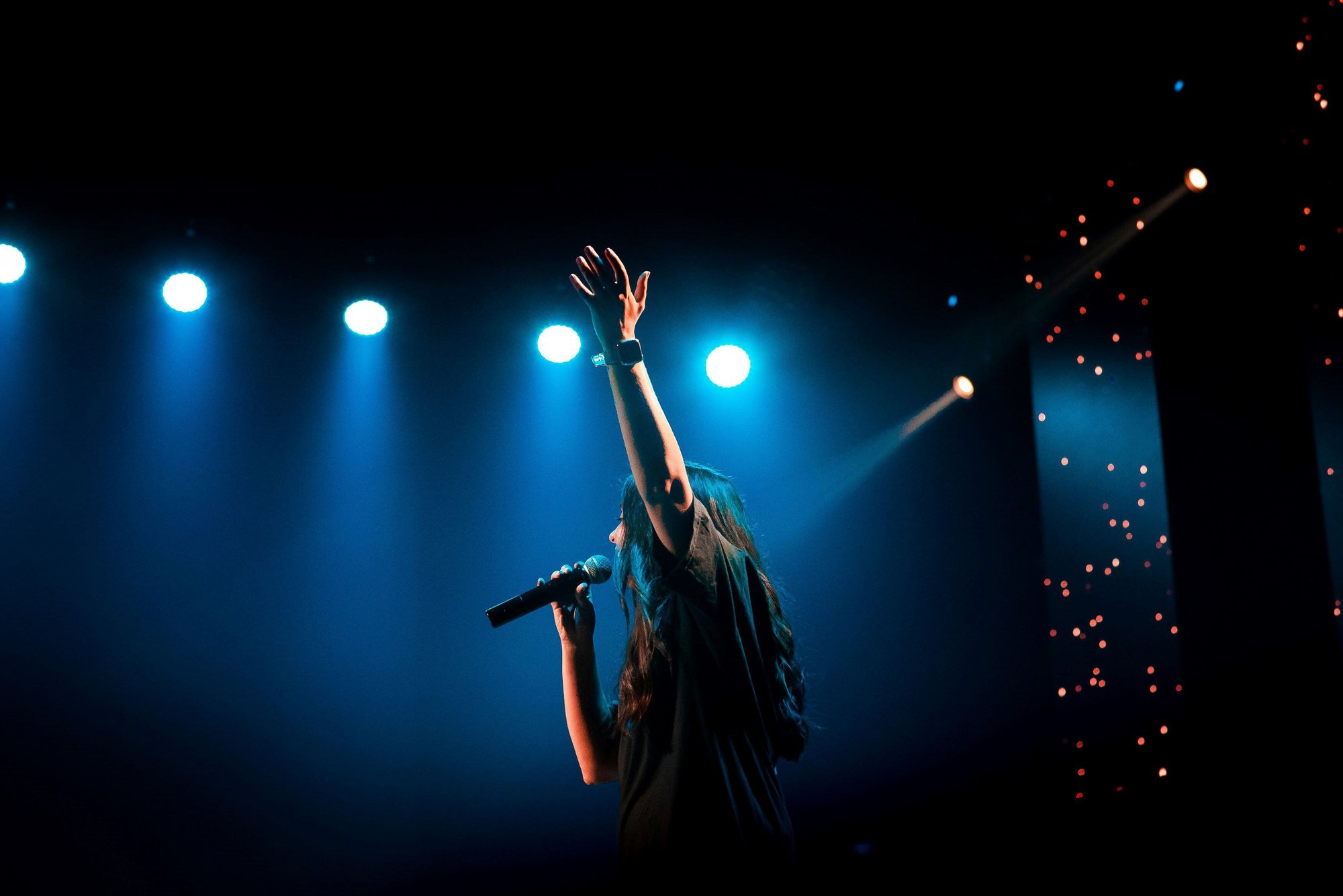 girl-performing-into-microphone