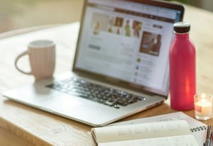 laptop-and-notebook-on-table-2
